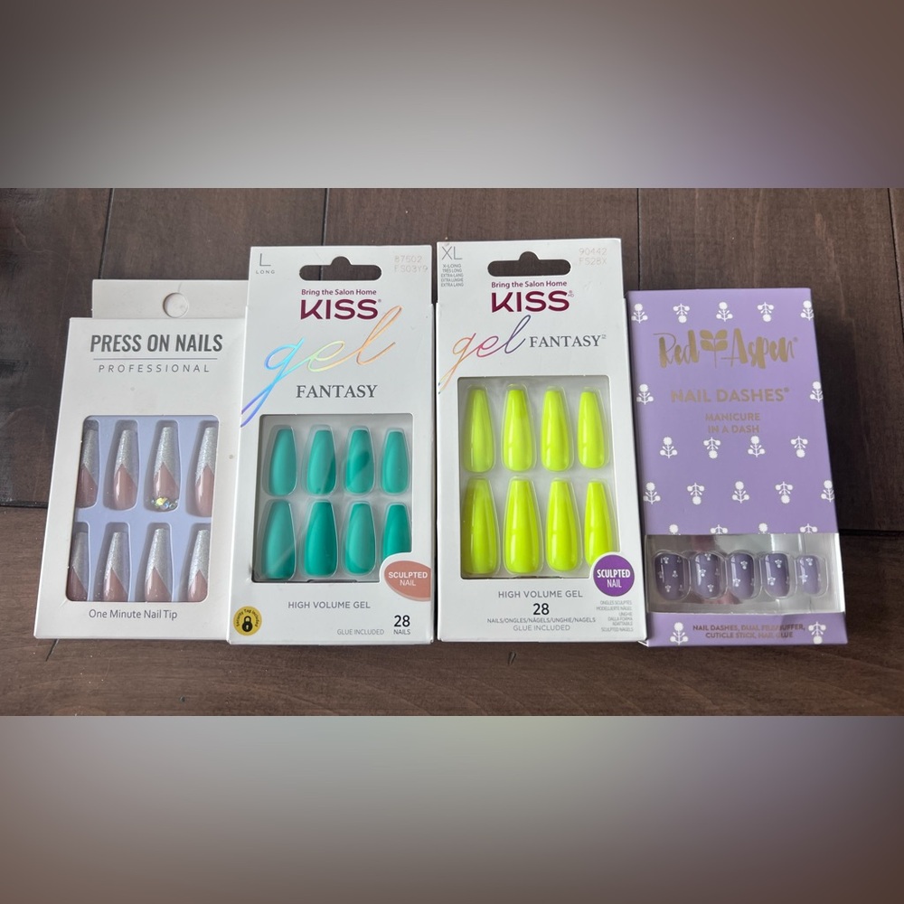 Assorted press on nails from KISS, Amazon and Red Aspen. They come with glue.